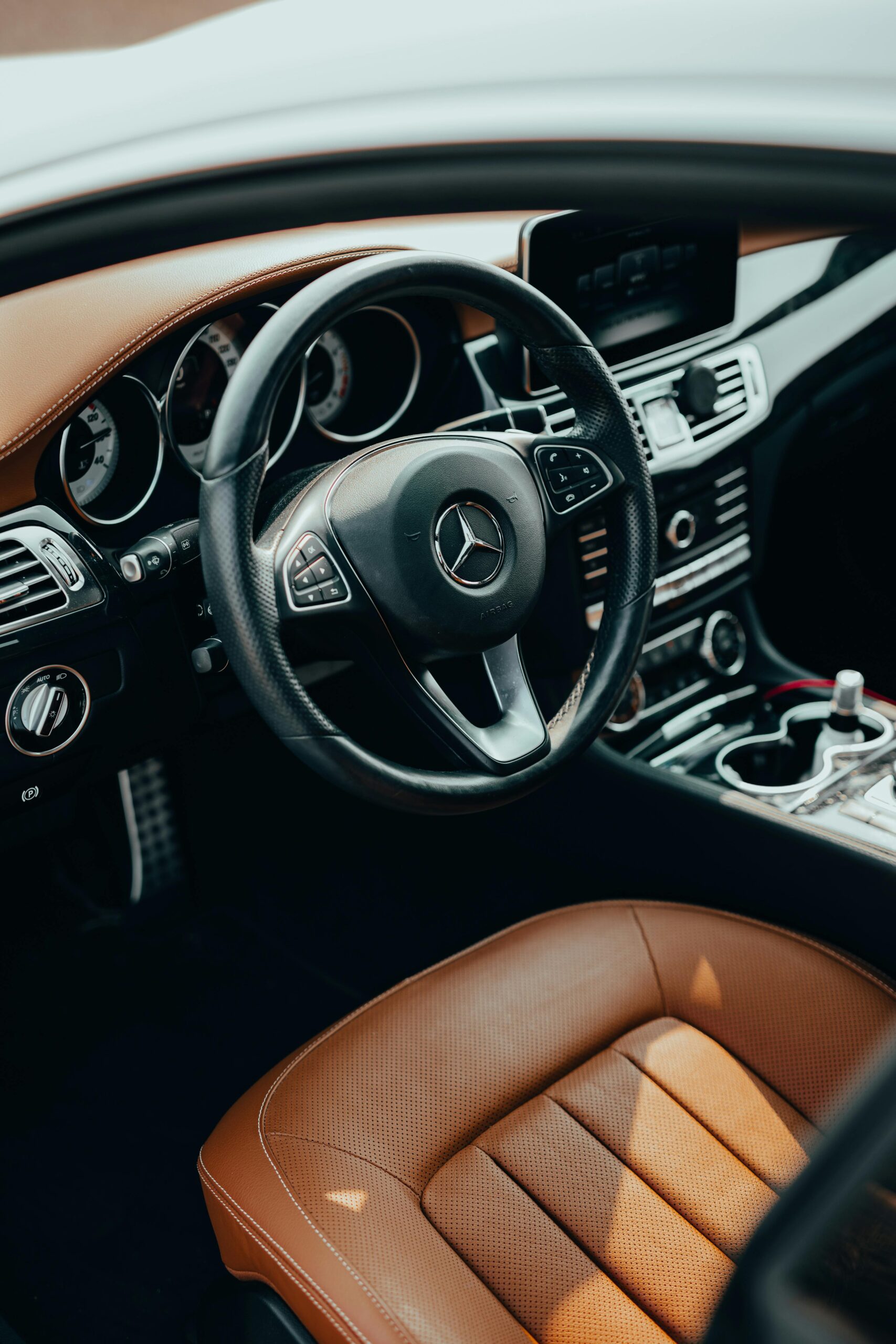 Services High-quality interior of a luxury vehicle showcasing leather seats and advanced technology dashboard.